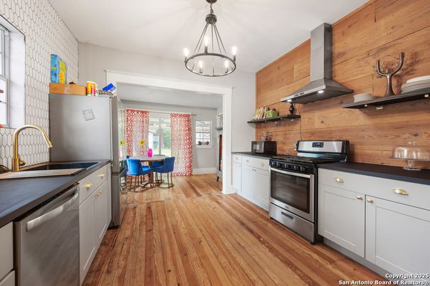 Dining room, Interior, Kitchen, Pendant Lights, Stainless Steel Appliances, Wood Texture Flooring