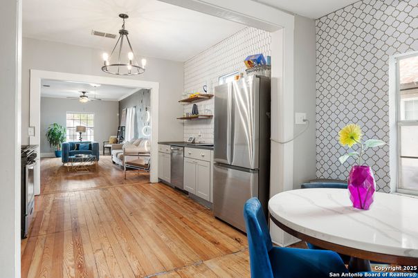 Dining room, Interior, Kitchen, Living room, Pendant Lights, Stainless Steel Appliances, Wood Texture Flooring