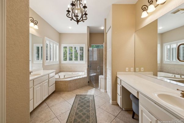 Bathroom, Chandelier, Dual Sink Vanities, Glass Shower, Interior, Recessed Lighting