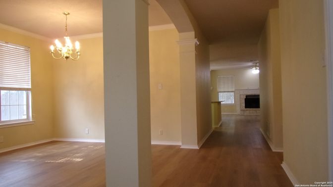 Chandelier, Empty room, Fireplace, Interior, Wood Texture Flooring