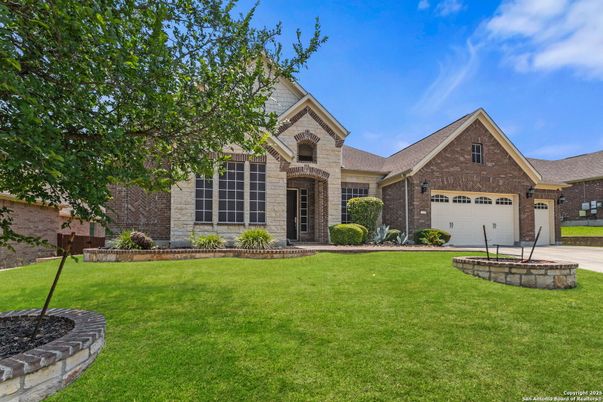 Attached, Backyard, Exterior, Facade, Brick Facade, Brick Traditional