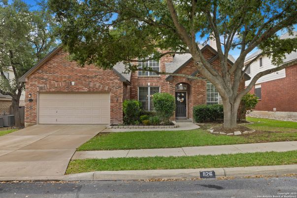 Attached, Exterior, Facade, Brick Facade, Brick Traditional