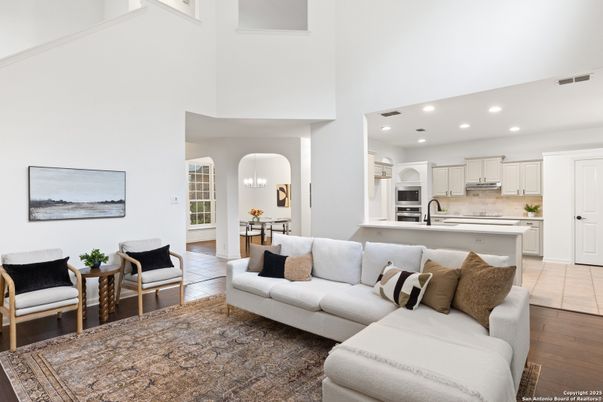 Dining room, Interior, Kitchen, Living room, Recessed Lighting, Stainless Steel Appliances, Wood Texture Flooring