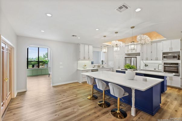 Chandelier, Interior, Kitchen, Pendant Lights, Recessed Lighting, Stainless Steel Appliances, Wood Texture Flooring