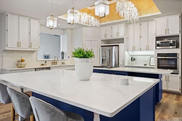 Chandelier, Interior, Kitchen, Pendant Lights, Recessed Lighting, Stainless Steel Appliances, Wood Texture Flooring