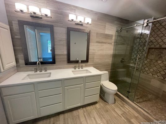 Bathroom, Dual Sink Vanities, Glass Shower, Interior, Wood Texture Flooring