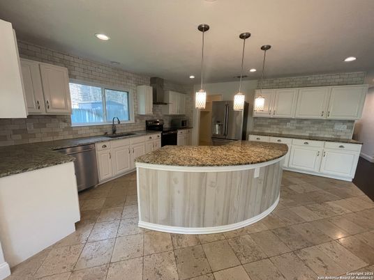 Interior, Kitchen, Pendant Lights, Recessed Lighting, Stainless Steel Appliances, Stone Walls