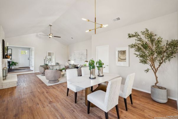 Dining room, Fireplace, Interior, Living room, Pendant Lights, Recessed Lighting, Wood Texture Flooring