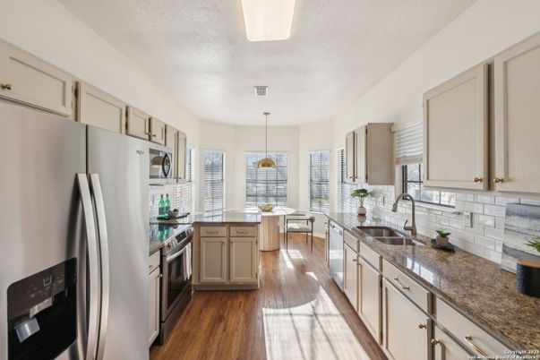 Dining room, Interior, Kitchen, Pendant Lights, Stainless Steel Appliances, Wood Texture Flooring
