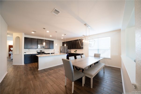 Dining room, Interior, Kitchen, Pendant Lights, Recessed Lighting, Stainless Steel Appliances, Wood Texture Flooring