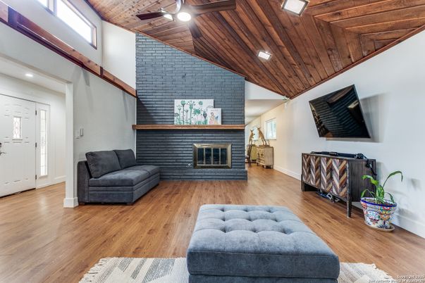 Fireplace, Interior, Recessed Lighting, Stone Walls, Wooden Ceilings, Wood Texture Flooring