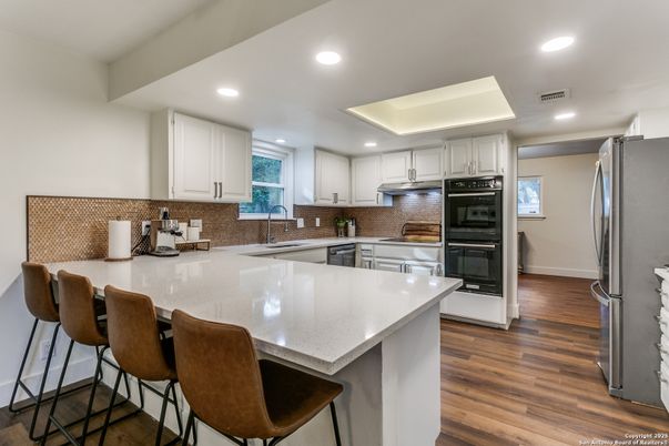 Interior, Kitchen, Recessed Lighting, Stainless Steel Appliances, Wood Texture Flooring