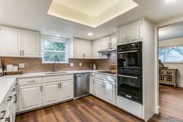 Interior, Kitchen, Recessed Lighting, Stainless Steel Appliances, Wood Texture Flooring