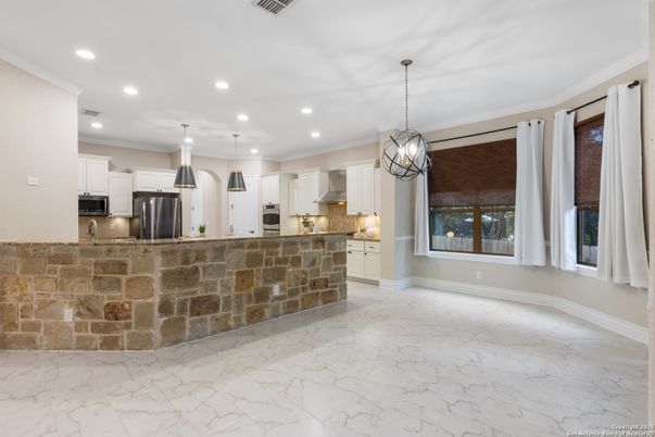 Interior, Kitchen, Marble, Pendant Lights, Recessed Lighting, Stainless Steel Appliances, Stone Walls