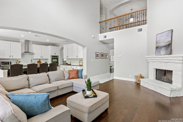 Dining room, Fireplace, Interior, Kitchen, Living room, Recessed Lighting, Wood Texture Flooring
