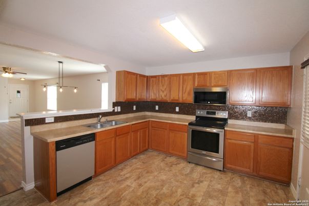 Interior, Kitchen, Pendant Lights, Stainless Steel Appliances, Wood Texture Flooring