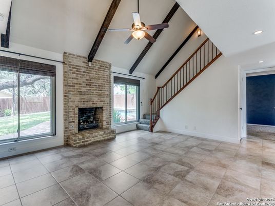 Empty room, Fireplace, Interior, Recessed Lighting, Stone Walls, Wooden Beams