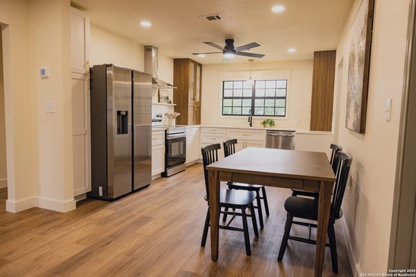 Dining room, Interior, Kitchen, Recessed Lighting, Stainless Steel Appliances, Wood Texture Flooring