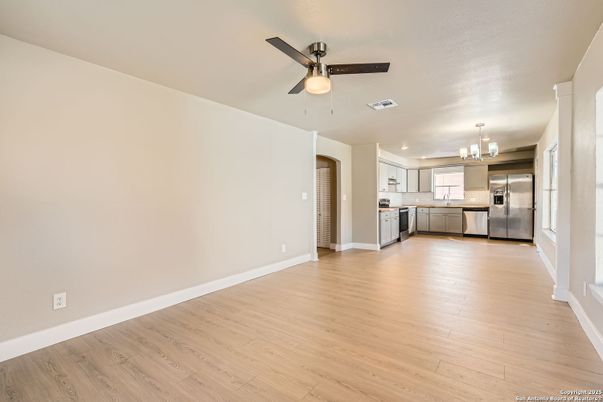 Chandelier, Empty room, Interior, Kitchen, Stainless Steel Appliances, Wood Texture Flooring