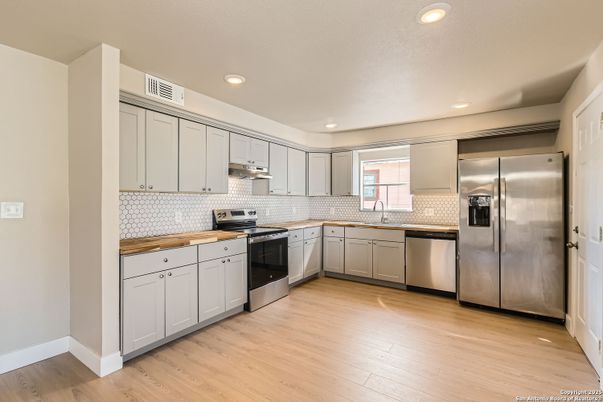Interior, Kitchen, Recessed Lighting, Stainless Steel Appliances, Wood Texture Flooring