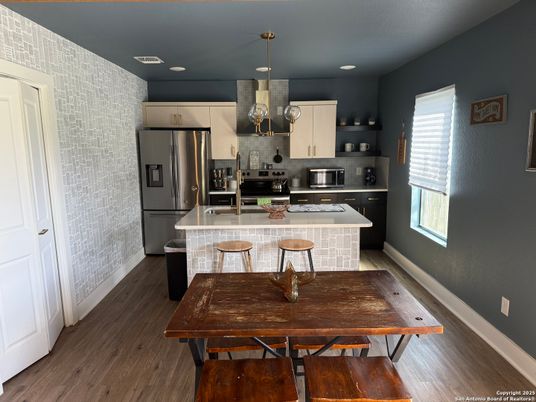 Dining room, Interior, Kitchen, Recessed Lighting, Stainless Steel Appliances, Wood Texture Flooring