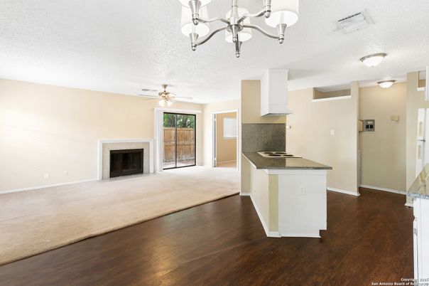 Chandelier, Empty room, Fireplace, Interior, Kitchen, Wood Texture Flooring