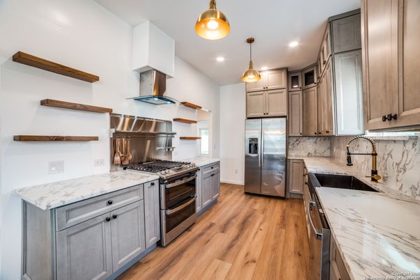 Interior, Kitchen, Pendant Lights, Recessed Lighting, Stainless Steel Appliances, Wood Texture Flooring