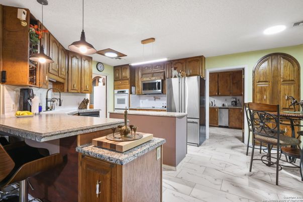Interior, Kitchen, Marble, Pendant Lights, Recessed Lighting, Stainless Steel Appliances