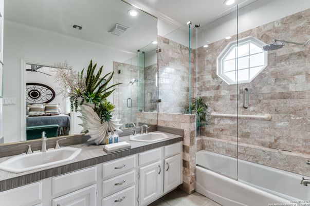 Bathroom, Dual Sink Vanities, Glass Shower, Interior, Recessed Lighting, Tile Countertops
