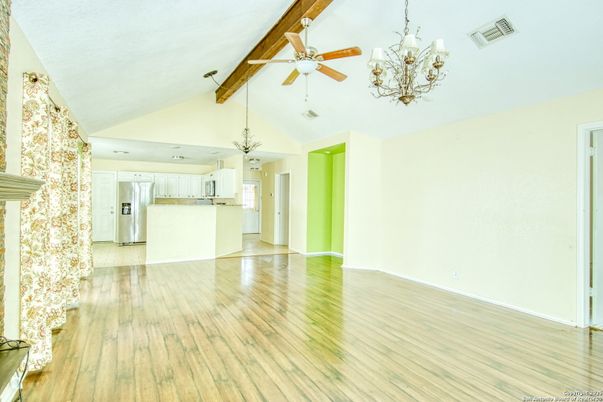 Chandelier, Empty room, Interior, Kitchen, Stainless Steel Appliances, Wooden Beams, Wood Texture Flooring