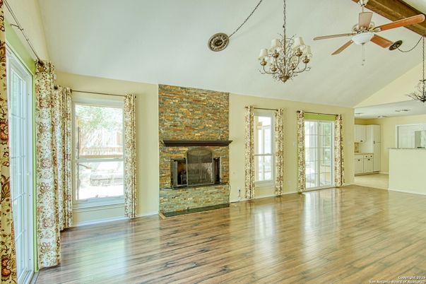 Chandelier, Empty room, Fireplace, Interior, Stone Walls, Wood Texture Flooring