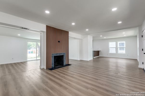 Empty room, Fireplace, Interior, Recessed Lighting, Wood Texture Flooring, Wooden Walls