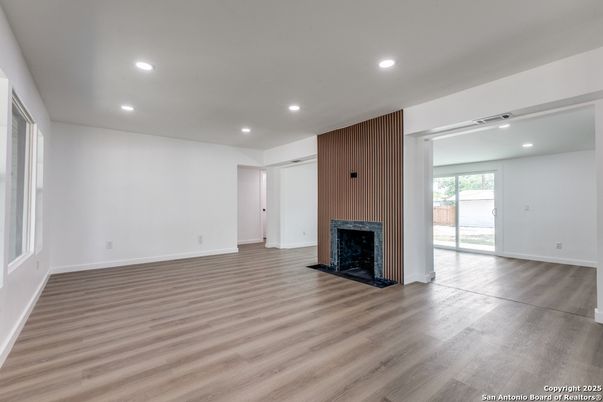 Empty room, Fireplace, Interior, Recessed Lighting, Wood Texture Flooring