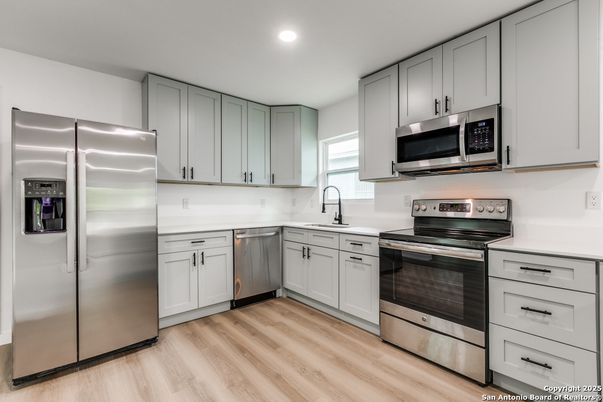 Interior, Kitchen, Recessed Lighting, Stainless Steel Appliances, Wood Texture Flooring