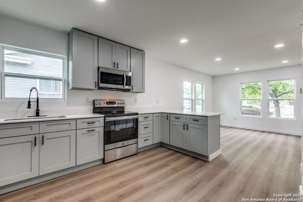 Interior, Kitchen, Recessed Lighting, Stainless Steel Appliances, Wood Texture Flooring