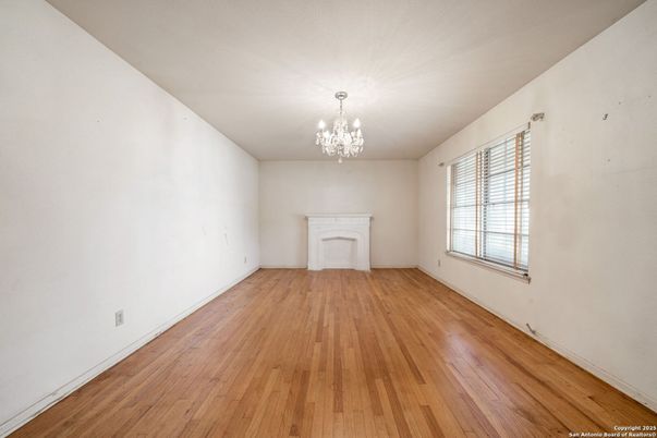 Chandelier, Empty room, Fireplace, Interior, Wood Texture Flooring