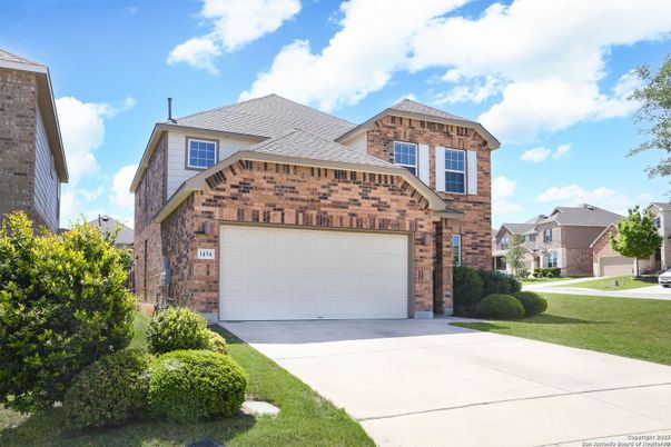 Attached, Exterior, Facade, Brick Facade, Brick Traditional