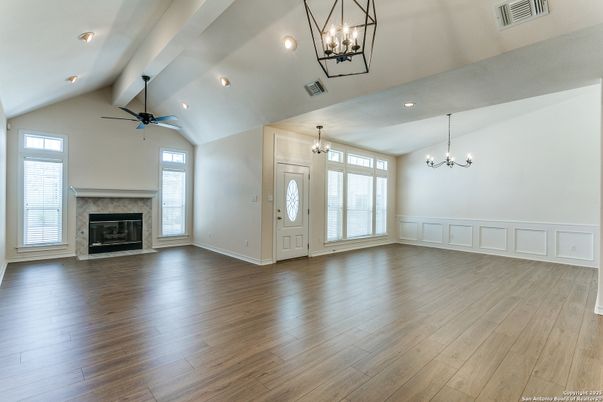 Empty room, Fireplace, Interior, Pendant Lights, Recessed Lighting, Wood Texture Flooring