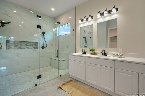 Bathroom, Dual Sink Vanities, Glass Shower, Interior, Marble Walls, Recessed Lighting