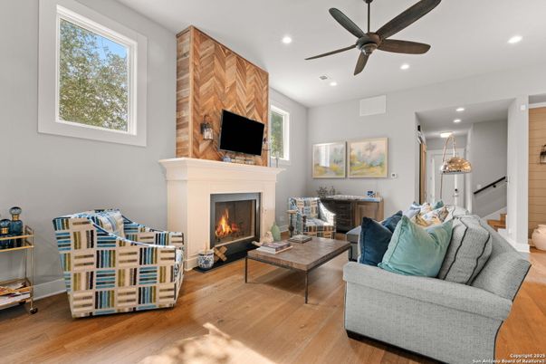 Fireplace, Interior, Living room, Recessed Lighting, Wood Texture Flooring