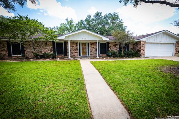 Attached, Backyard, Exterior, Facade, Brick Facade, Ranch