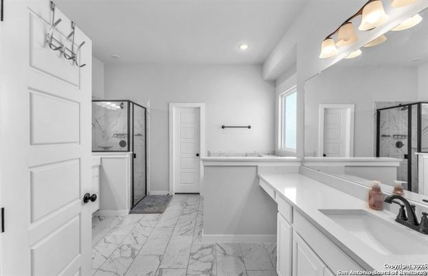 Bathroom, Dual Sink Vanities, Glass Shower, Interior, Marble, Marble Walls, Recessed Lighting