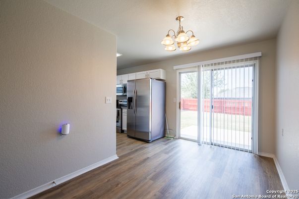 Chandelier, Empty room, Interior, Kitchen, Stainless Steel Appliances, Wood Texture Flooring