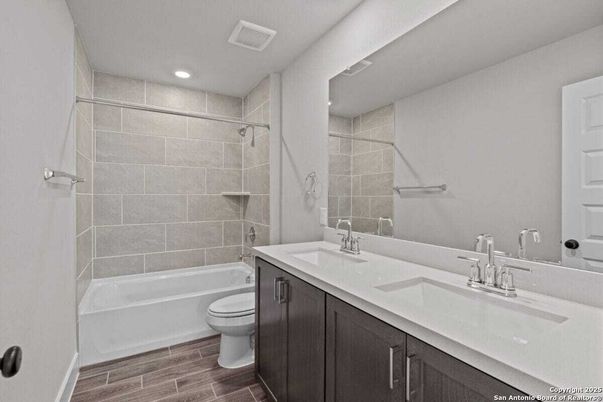 Bathroom, Dual Sink Vanities, Interior, Recessed Lighting, Wood Texture Flooring
