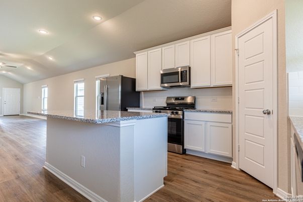 Interior, Kitchen, Recessed Lighting, Stainless Steel Appliances, Wood Texture Flooring