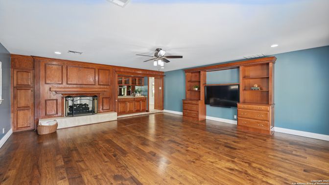 Empty room, Fireplace, Interior, Recessed Lighting, Wood Texture Flooring, Wooden Walls