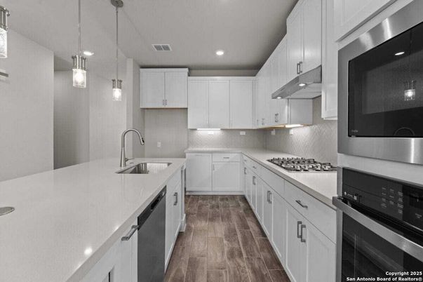 Interior, Kitchen, Pendant Lights, Recessed Lighting, Stainless Steel Appliances, Wood Texture Flooring