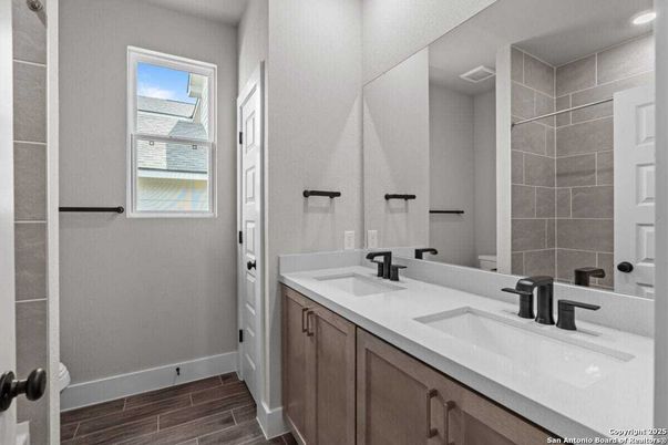 Bathroom, Dual Sink Vanities, Interior, Recessed Lighting, Wood Texture Flooring