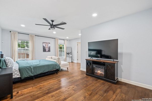 Bedroom, Fireplace, Interior, Recessed Lighting, Wood Texture Flooring