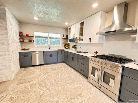 Interior, Kitchen, Recessed Lighting, Stainless Steel Appliances, Stone Walls